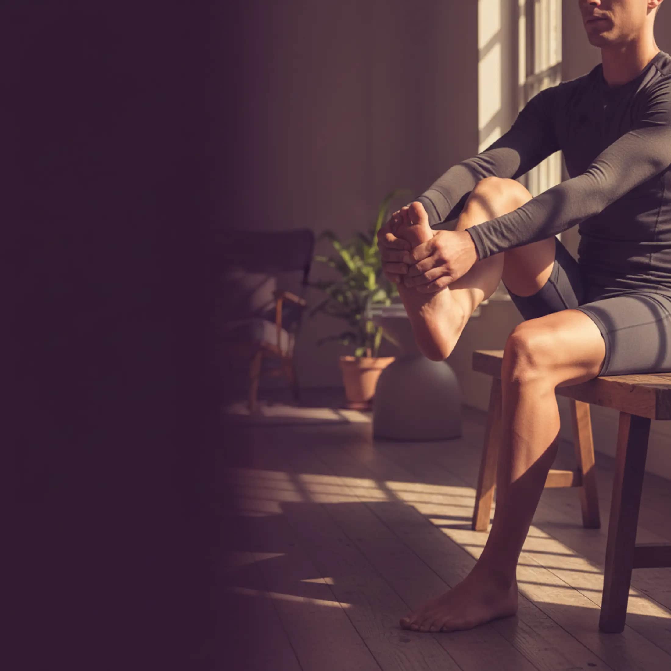 Tissue-repair research peptides — BPC-157 and TB-500 for regenerative studies, athlete stretching in a sunlit recovery studio